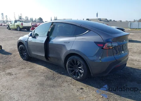 2023 Tesla Model Y Awd/Long Range Dual Motor All-Wheel Drive z USA, uszkodzony, nr VIN 7SAYGDEE2PF896326